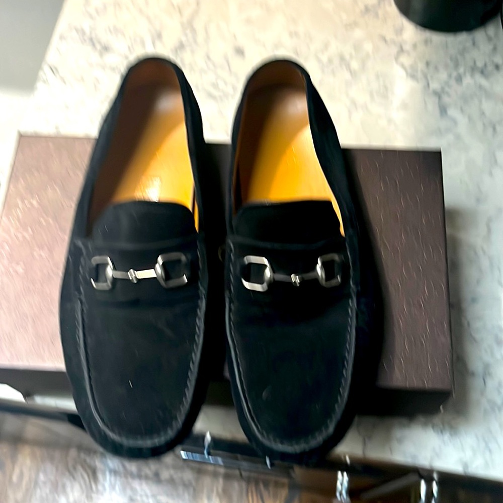 Black suede Gucci driving loafers.  Mint condition barely worn.  With box
